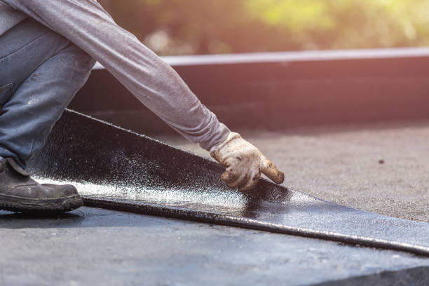 Professional Basement Waterproofing technician working in Amherst, OH
